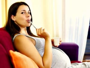 pregnant woman eating calcium rich foods