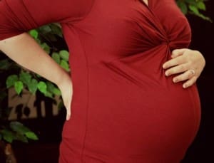 woman with a pregnancy backache