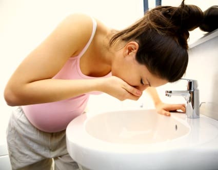 woman having 1st trimester morning sickness
