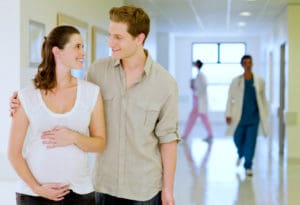 Happy couple tours the hospital before birth