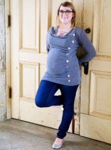 Pregnant woman rocking her favorite pair of maternity jeans