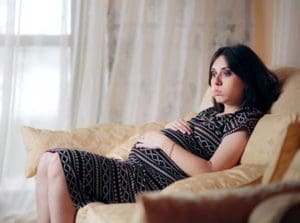 pregnant woman full of questions looking for answers